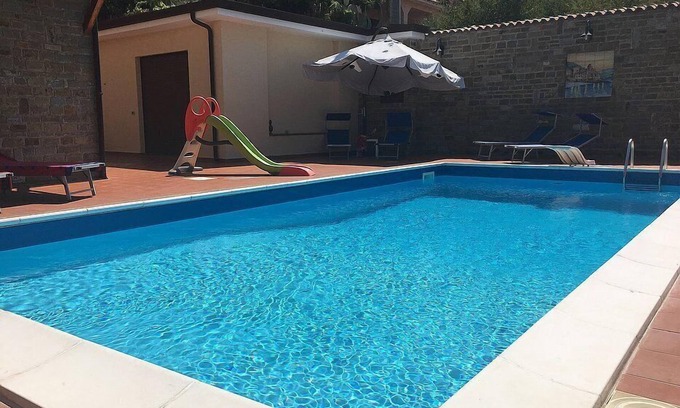 Santa Maria di Castellabate Villa | Villa Ludovica: An elegant and welcoming apartment that is part of a villa located on a hillside, facing the sea, with Free WI-FI.