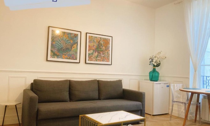 Cœur de Ville Apartment | Villa muguette - coeur de Vichy- RDC-véranda sur la terrasse