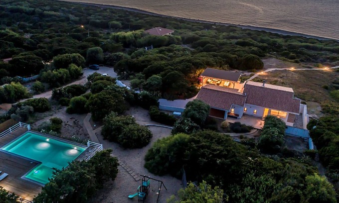 Li Junchi Villa | Villa Napius - private beach access on a sandy beach