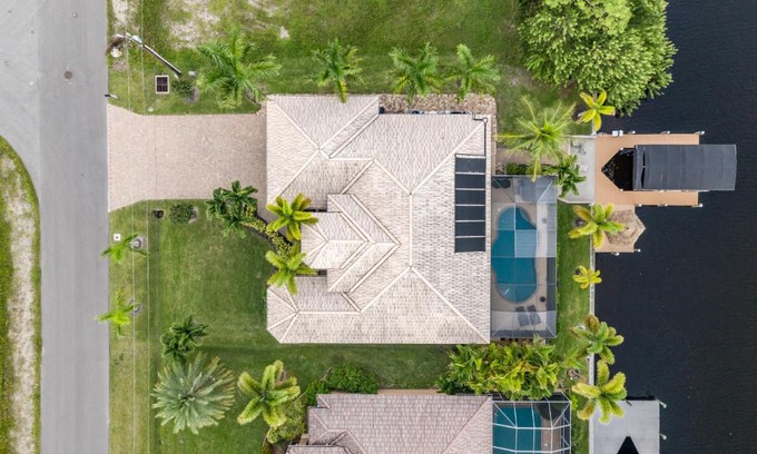 Burnt Store House | Villa Neptune's Grotto- BRAND NEW with heated Pool, Hot Tub, and dock with Tiki