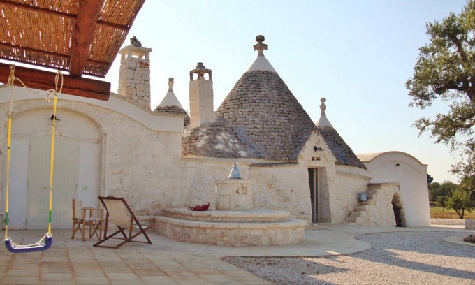 Ostuni Villa | Villa of 4 conical roofs (trullo), fully renovated in big property. Sea view