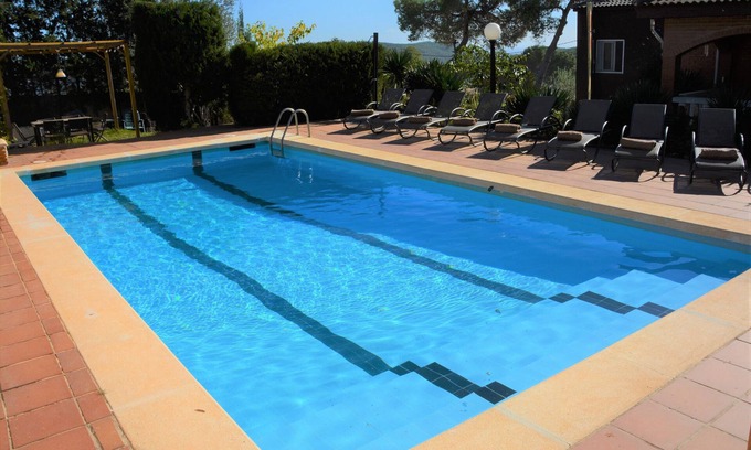 Sitges Villa | Villa Sitges Soledad 15 minutes drive from Sitges. A/C. XXL swimming pool. 12 p.