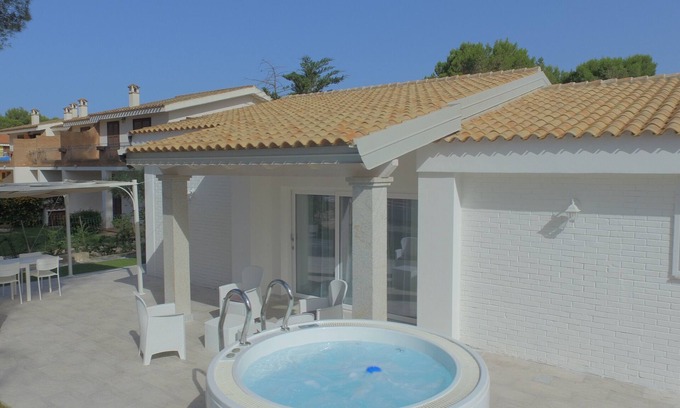 Porto Pino Villa | VILLA Via Marina IKEBANA Porto Pino, prestigious and finished seaside villa