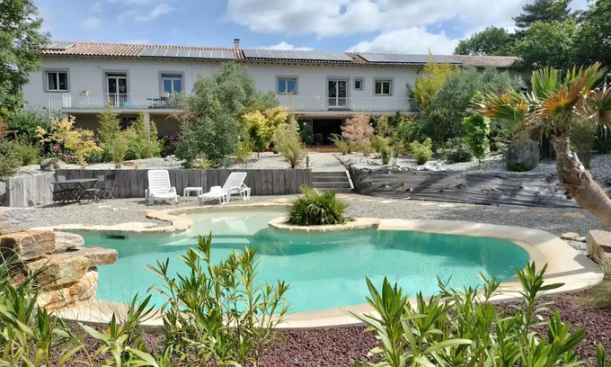 Vaudreuille Villa | Villa 'Zen Et Tropicale' with Mountain View, Shared Pool and Wi-Fi