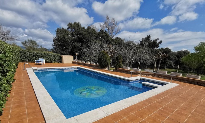 Llagostera House | VILLAS COSETTE HOUSE MASIA CAN TIBAU surrounded by forests and fields