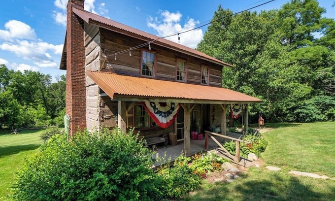 Flora Cabin | Vintage 1850's Log Cabin Glamping