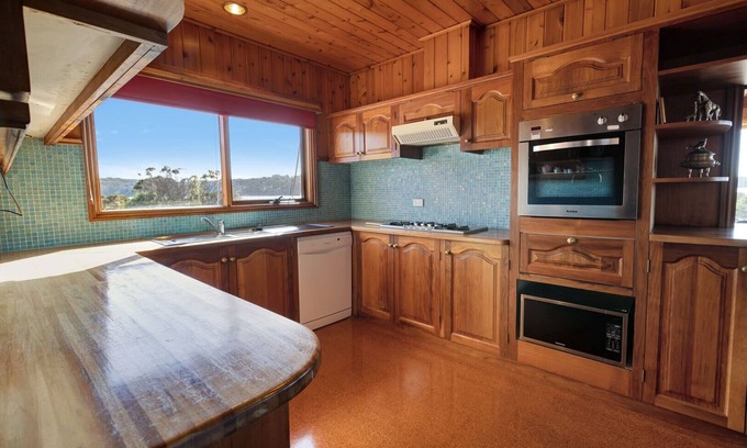 Lake Tyers Beach House | Wake up to panoramic views of the lake from the comfort of your cozy retreat