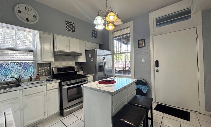 Logan Square House | Walkup Greystone steps to Logan Square restaurants, shopping bars and nightlife.