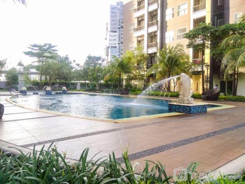 Pinang Apartment | Warm and Comfort Stay 1BR Apartment at Silkwood Residences By Travelio
