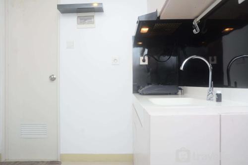 East Jakarta Apartment | Warm and Minimalist 1BR at Signature Park Grande Apartment By Travelio
