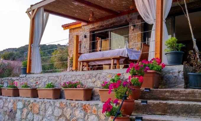 Marmaris City Center Villa | Warm, quiet stone house with sea views and breathtaking sunsets.