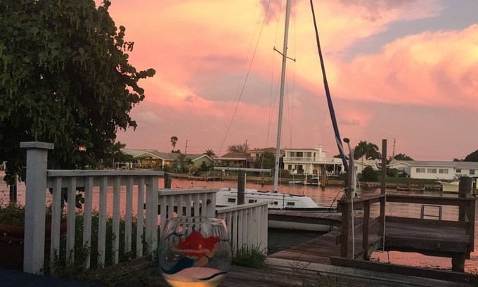 Capri Isle House | Watch sunsets from waterfront deck of 3,000 sq-ft. home in Tampa Bay beach town!