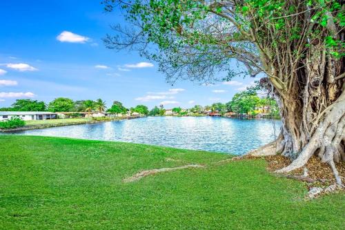 Survey Creek Apartment | Water View - 1st Floor - Stocked - Palm Wave Says