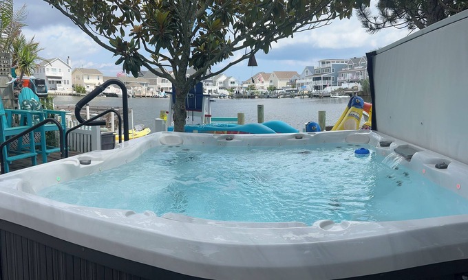 Seaside Heights Villa | WATERFRONT 2ndFl Sky Villa w Full Itinerary ON-SITE Jacuzzi, kayak, Arcade, Dock