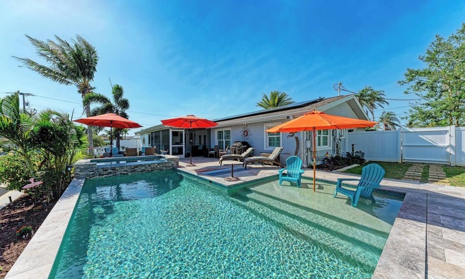 Whitney Beach House | Waterfront, Boat Dock, 5 Min to AMI, Heated Pool & Hottub