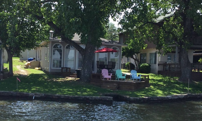 Graford House | Waterfront Cabin with Boat Dock steps from the deck