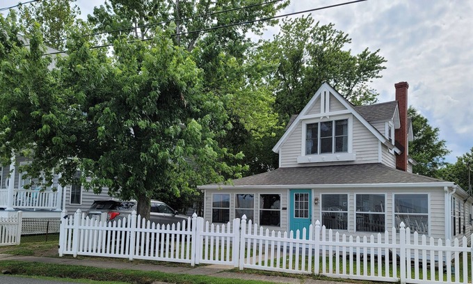 Colonial Beach House | Waterfront Coastal Farmhouse, Private Pier, Fire Pit with Separate Bunk House