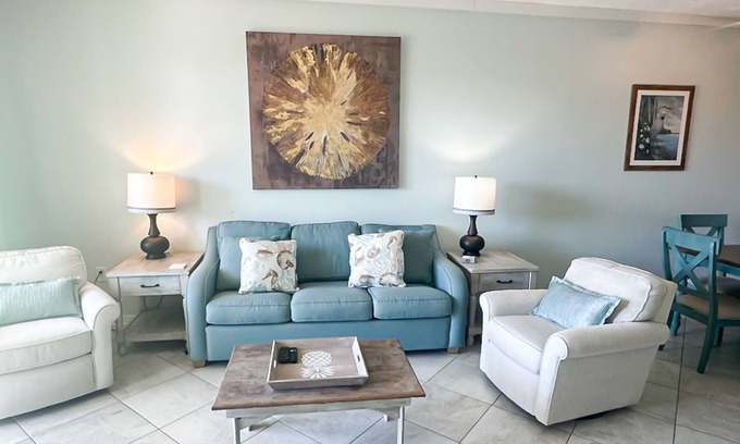 Fort Morgan Condo | Waterfront condo w/balcony, boat slip, shared hot tubs, pools