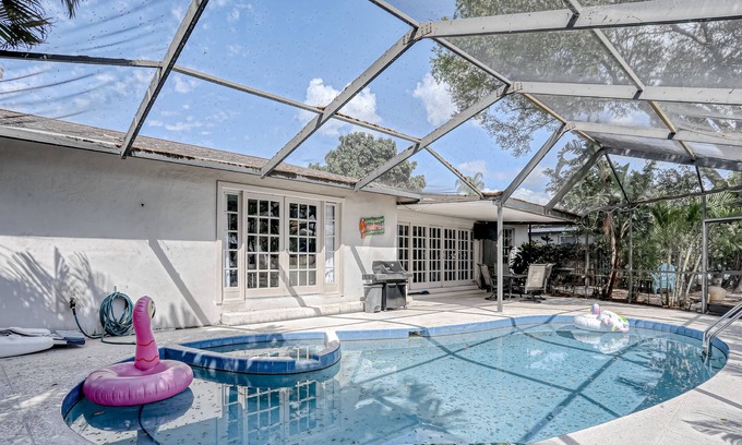 Bay Crest Park House | Waterfront escape with a private pool, dock, fast WiFi, & A/C - Dogs allowed