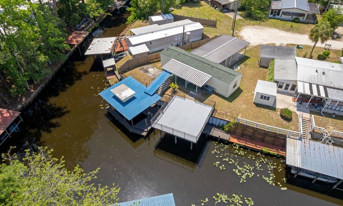 Satsuma House | Waterfront home in Satsuma. Two bedrooms each with full bath. Gas grill.