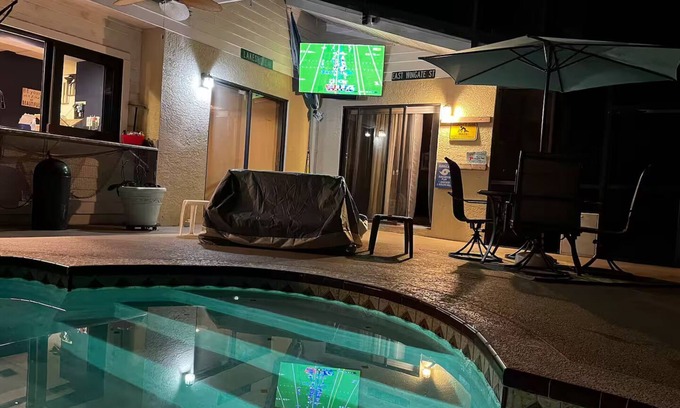 Palm Harbor House | Waterfront Lake Tarpon Home with heated salt water pool, fitness room, WiFi