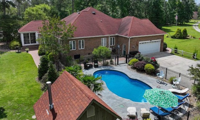 Pinecrest House | Waterfront Mansion w/Saltwater Pool, Dock, Game room, Tiki Bar, Kayaks + More