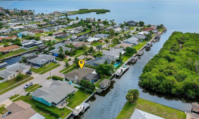 Merritt Island House | Waterfront Oasis w/Private Heated Pool & Dock