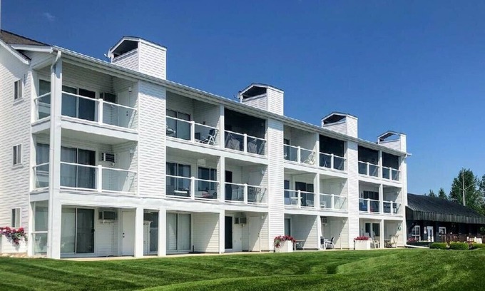 Charlevoix Condo | Waterfront Setting w/Top-Floor Views Overlooking Lake Charlevoix