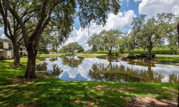 Wesley Chapel Condo | Waterfront Studio w/2 Queen Beds, Patio & Smart TV – Cozy & Convenient for a Relaxing Getaway!