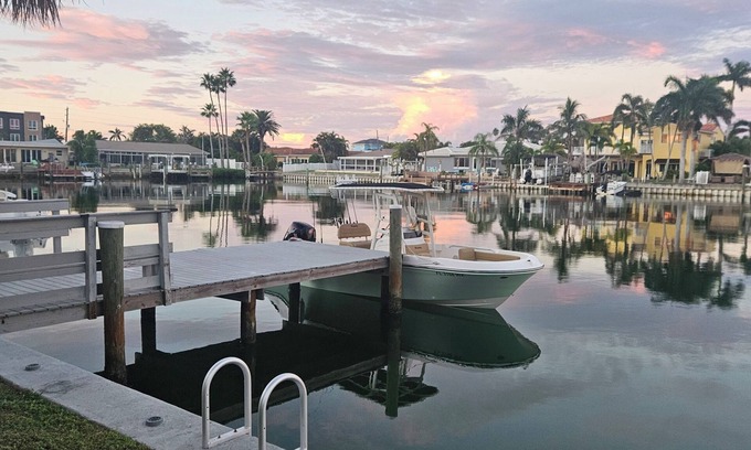 Capri Isle Condo | Waterfront Treasure Island Oasis, Dock, Sunsets & Walk to Beach + John’s Pass