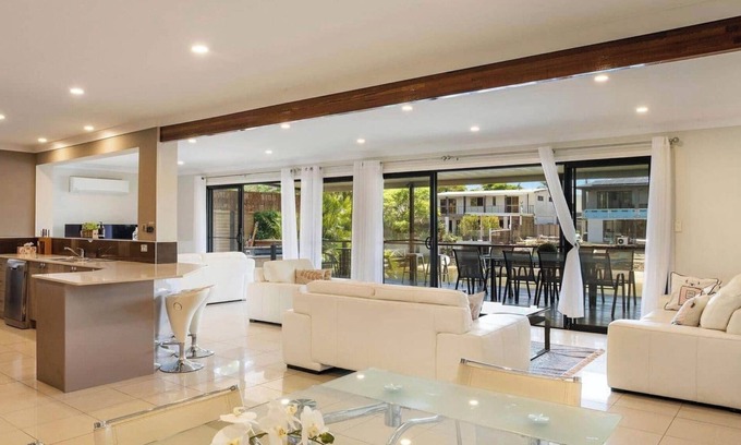 Broadbeach Waters House | Waterfront vista East facing to water pretty view day and night.