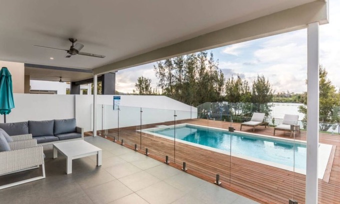 Helensvale House | Waterfront Wonder - Pool, Views & Luxury in Helensvale