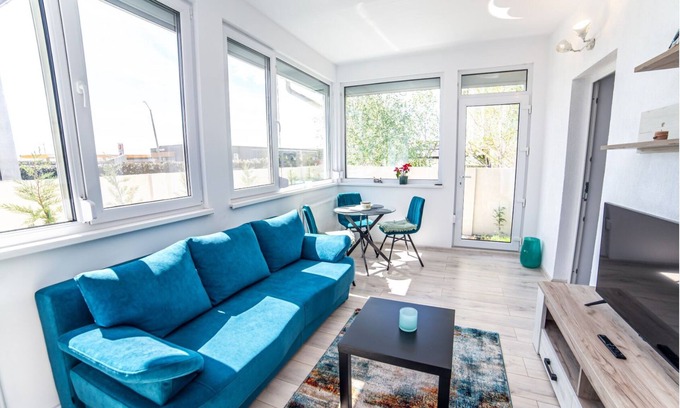 Tunari House | Welcome to GardenHideaway! Cozy stay with new furniture in a serene setting.