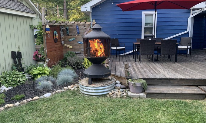 Indian River House | Welcome to Maison Bleu…just 200 steps away from the waters edge of Burt Lake!