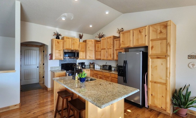 Laramie House | Welcoming home on the outskirts of town, quiet neghborhood, beautiful views.