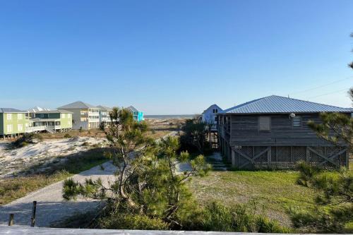 Fort Morgan House | Whitesands South Relax in comfort at this duplex within walking distance of the beach