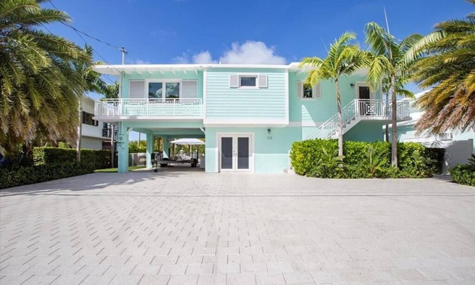 White Marlin Beach House | Why watch the Sunrise when you have a Mangrove Sunset