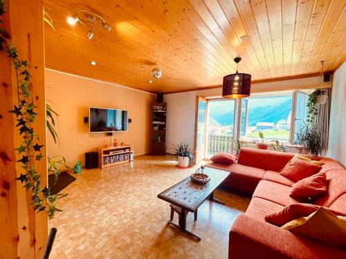 Poschiavo Apartment | window on the green