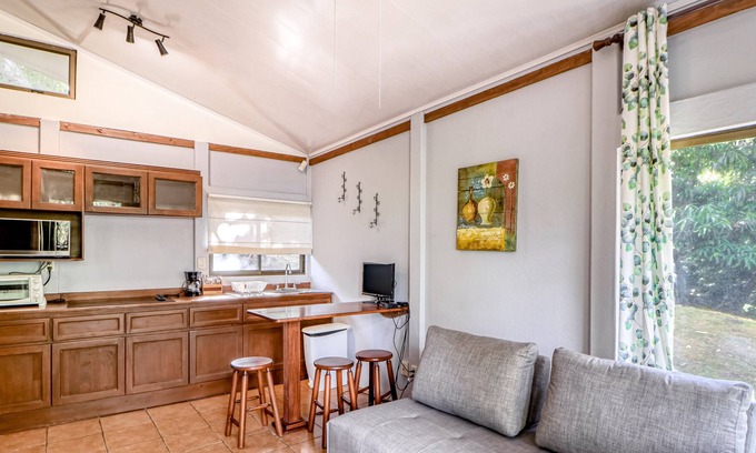 Santa Eulalia Cabin | Wonderful ground-level cabin with gardens, terrace, and shared pool!