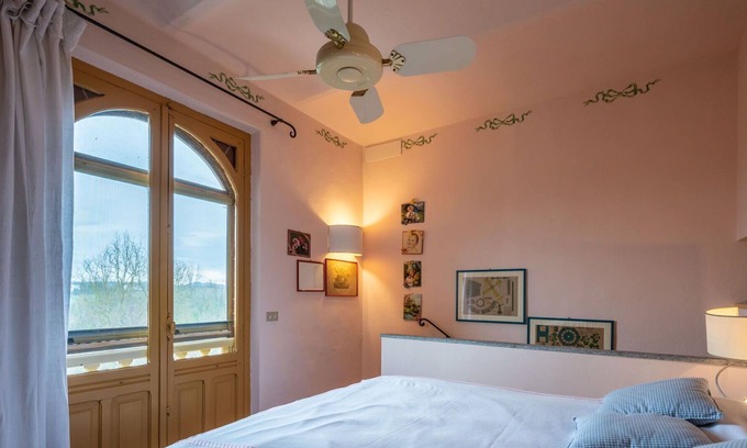 Belveglio House | Wonderful private villa for 3 guests with TV, patio, pets allowed and parking