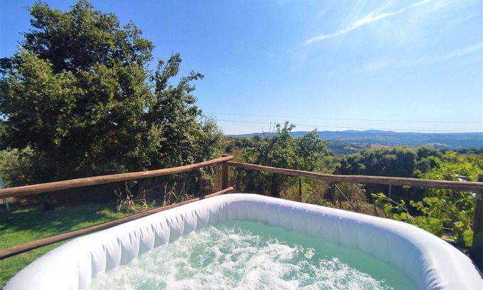 Scansano House | Wonderful private villa with hot tub, WIFI, TV, terrace, pets allowed, panoramic view and parking
