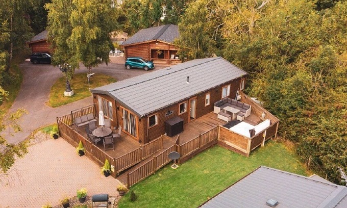Morpeth Cabin | Woodys Lodge, 3 bedroom premier property on Felmoor Park, Hot tub, dog friendly.