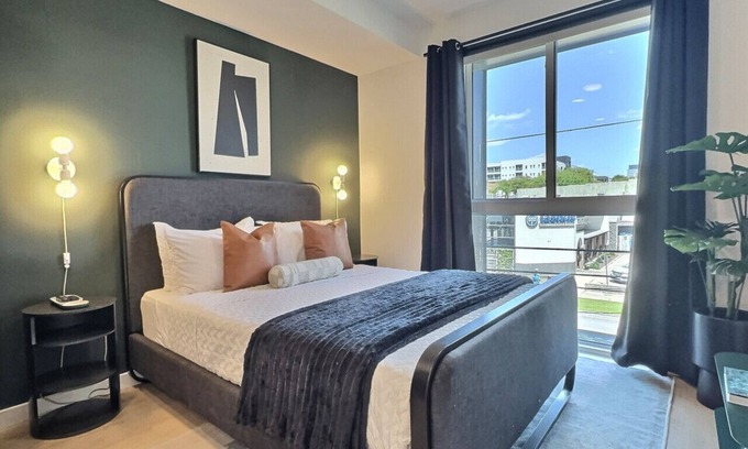 Five Points South Apartment | Work Trip Ready | Tesla Rides | Gym | Near UAB