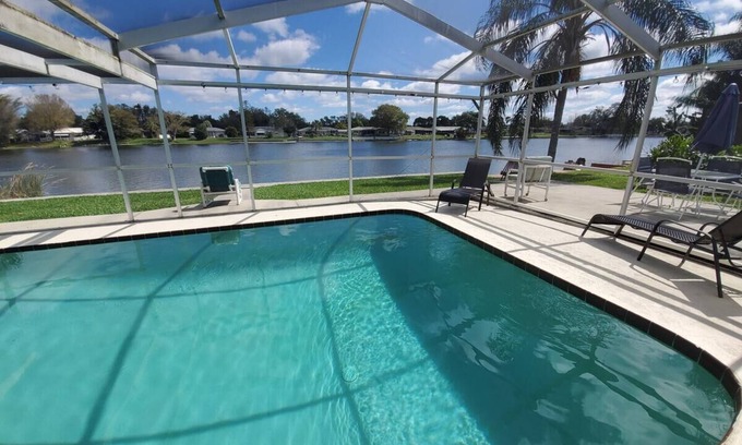 Jasmine Lakes House | WOW Waterfront Heated Pool Home by BEACH Sleeps 12
