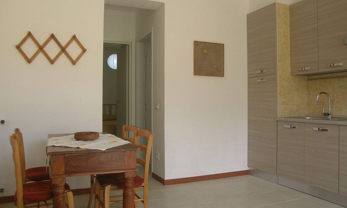Lacona Apartment | yellow apartment l'0leandra immersed in the olive grove