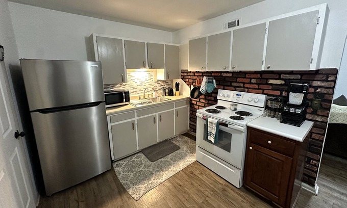 Tulsa House | Yellow House with the Red Door - 5 minute drive to Hardrock Casino!