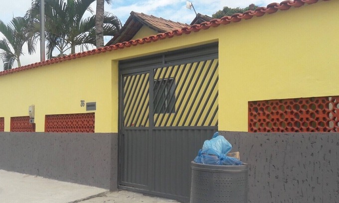 Prado House | Yellow vacation home