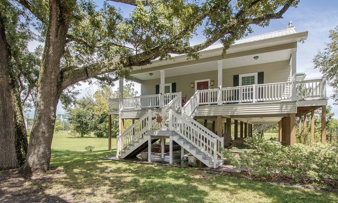 Henderson Point House | Your Only Worry Should Be If The Tide Is Going To Reach Your Chair!