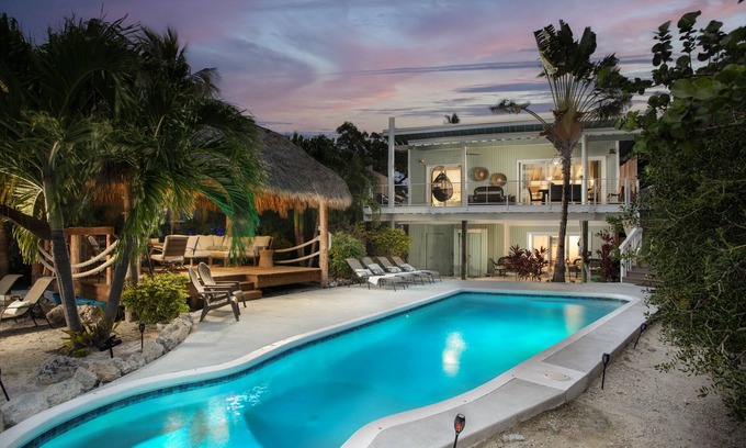 Bay Point House | Your own Private Resort! 50ft Dock on Canal w/Pool, Tiki and RV Hookup!