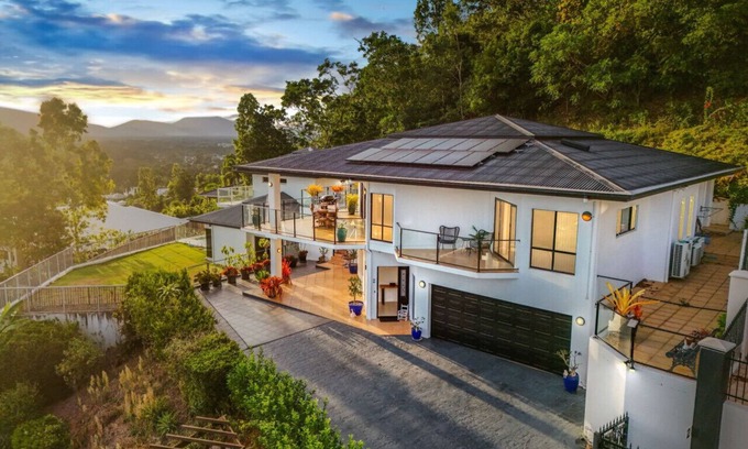 Mooroobool House | Your Ultimate Escape in Mooroobool- Luxury Tropical Retreat with Pool & Stunning Views – Perfect for Families & Groups!